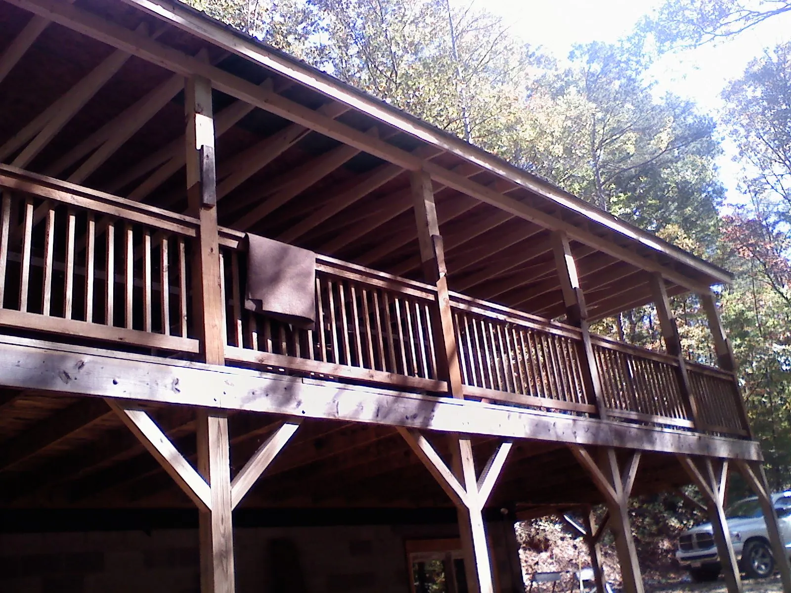 Timber framing under a new elevated porch and deck — Roof Leak Repair in Montauk by Roofing Brothers